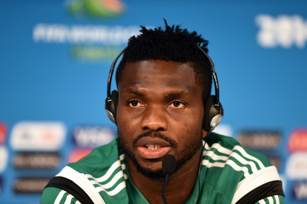 Nigerias defender Joseph Yobo answers a question during a press conference before a training session at the Pantanal Arena in Cuiaba, Brazil on June 20, 2014