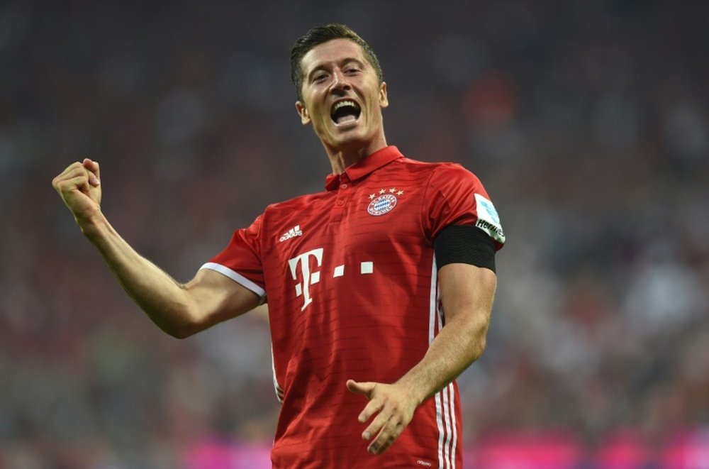 Bayern Munichs Polish striker Robert Lewandowski, pictured on August 26, 2016, finished a 6-0 Bayern win over Werder Bremen with a hat-trick, despite having a gaping hole on the top of his right boot, with which he scored all three goals