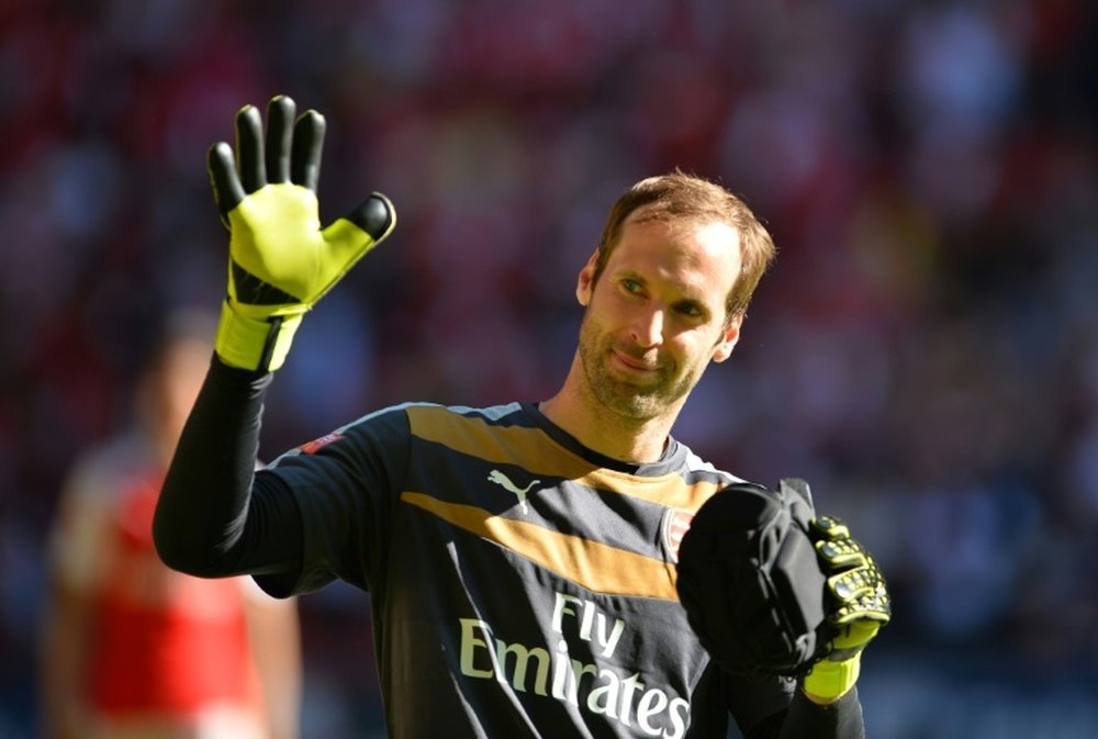 Arsenals goalkeeper Petr Cech celebrates on the pitch after the FA Community Shield football match at Wembley Stadium in north London on August 2, 2015