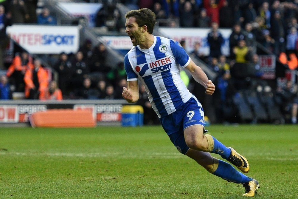 Grigg scored twice as Wigan downed West Ham. AFP