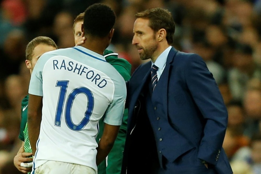 Southgate hails 'exciting' Rashford as striker leads England's youth movement. AFP