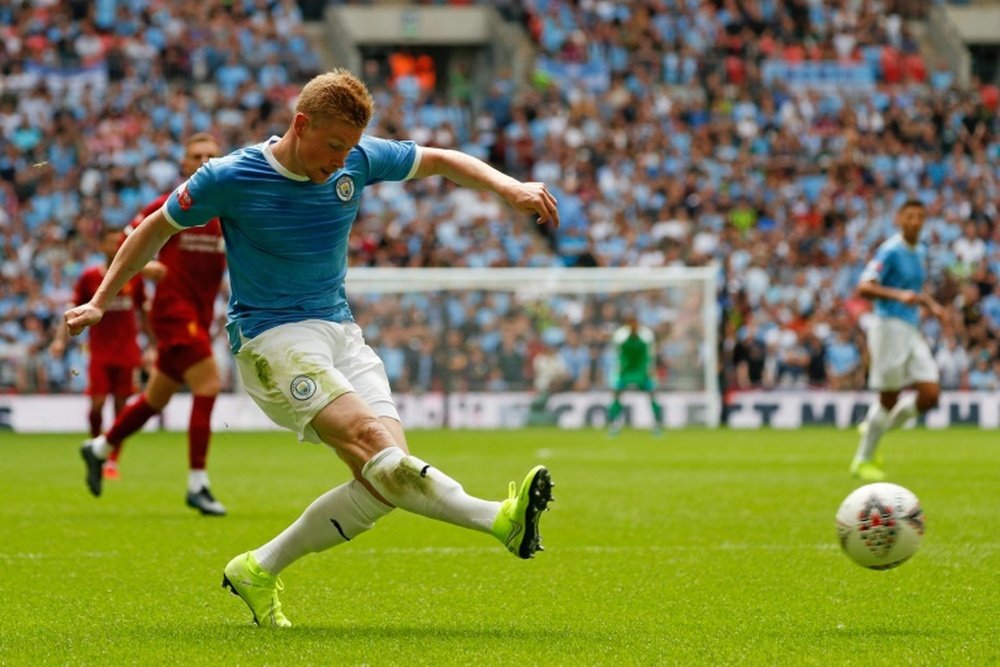 O recorde de assistências de De Bruyne. AFP