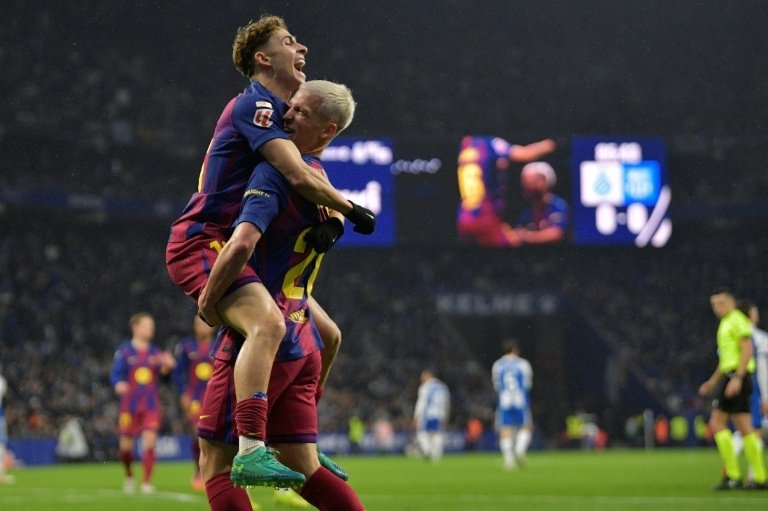 Olmo, Lewandowski grab Barca late victory in Espanyol derby clash