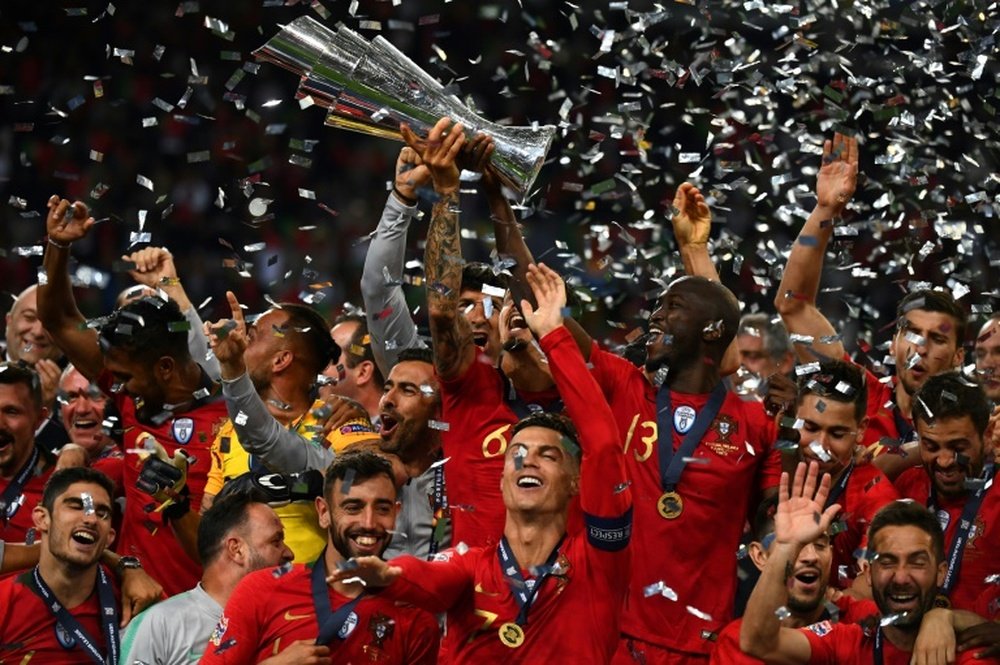Portugal lift the Nations League trophy. AFP