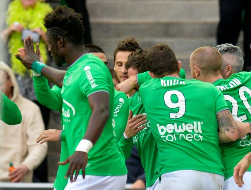 Saint-Etiennes players celebrate after scoring during aFrench L1 football against Angers on December 20, 2015