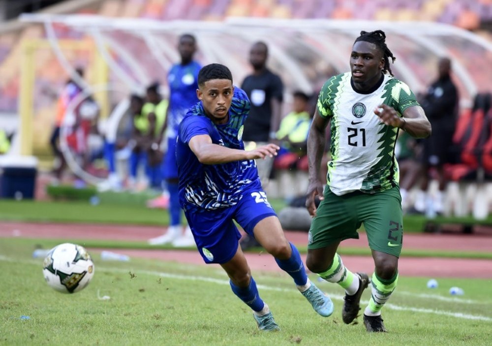 Arsenal tried to sign Calvin Bassey (R). AFP