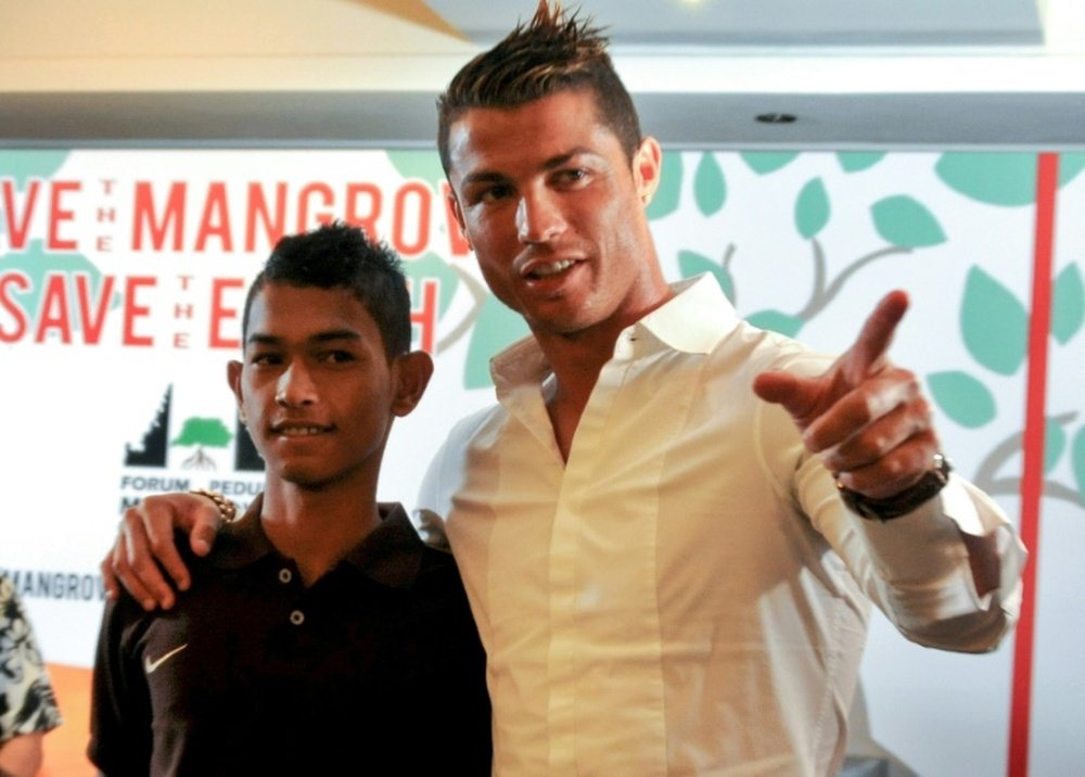 Martunis has sometimes been described as Christiano Ronaldos adopted son. AFP