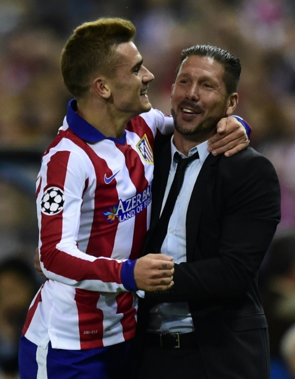 Griezmann (L) feared that Simeone was going to leave Madrid for the French capital. AFP