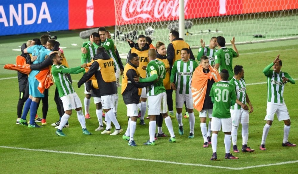 Atletico Nacional players celebrate winning the Club World Cup third-place playoff. AFP