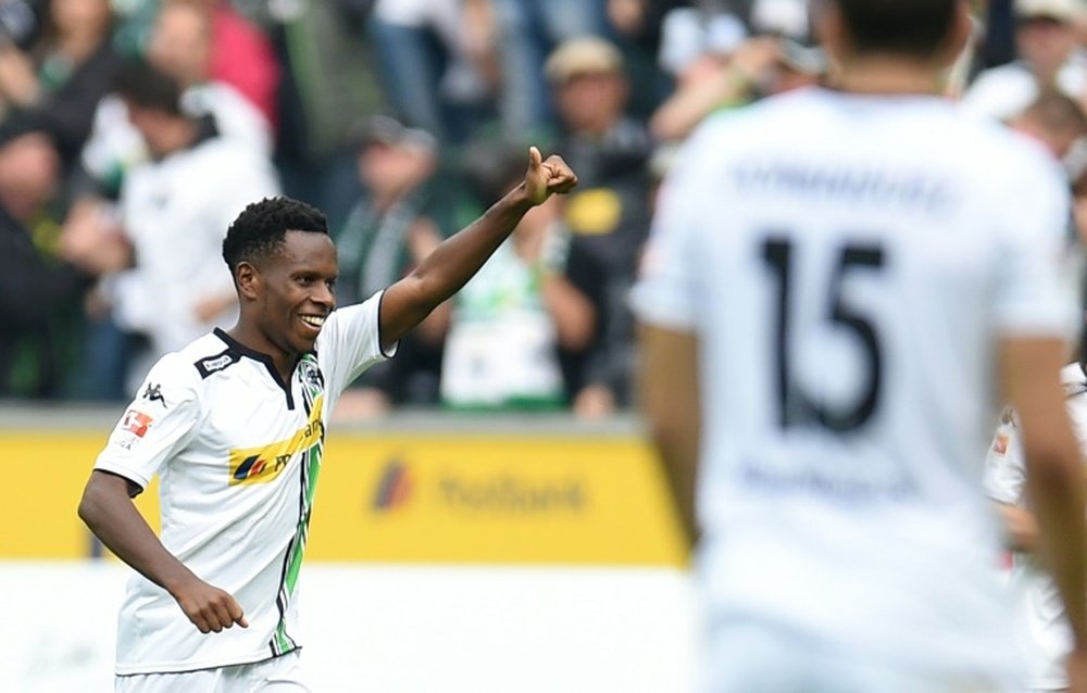 Moenchengladbachs midfielder Ibrahima Traore celebrates during a German first division Bundesliga football match against Wolfsburg in Moenchengladbach, western Germany, on October 3, 2015