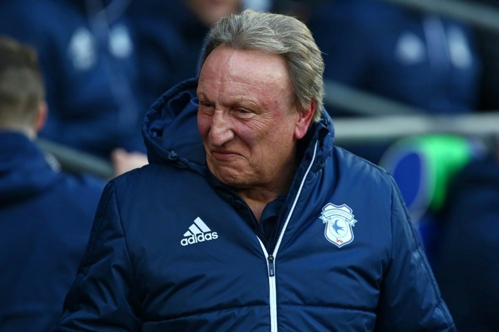 Elvis Azah is currently on trial at Neil Warnock's Cardiff. AFP