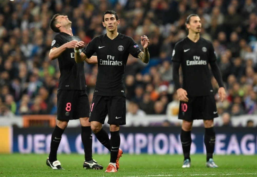Paris Saint-Germains Thiago Motta (L), Angel Di Maria and Zlatan Ibrahimovic react to a missed goal opportunity during their UEFA Champions League group stage against Real Madrid at the Santiago Bernabeu stadium on November 3, 2015