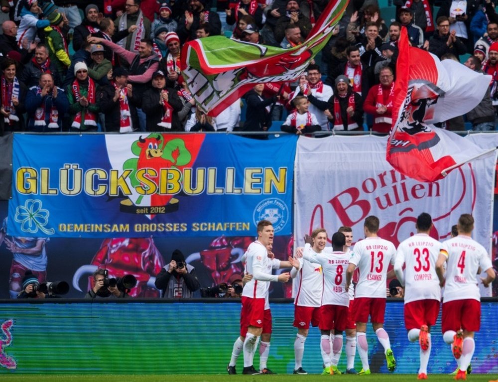 Les joueurs de Leipzig célèbrent un but lors du match de Bundesliga contre Cologne. AFP