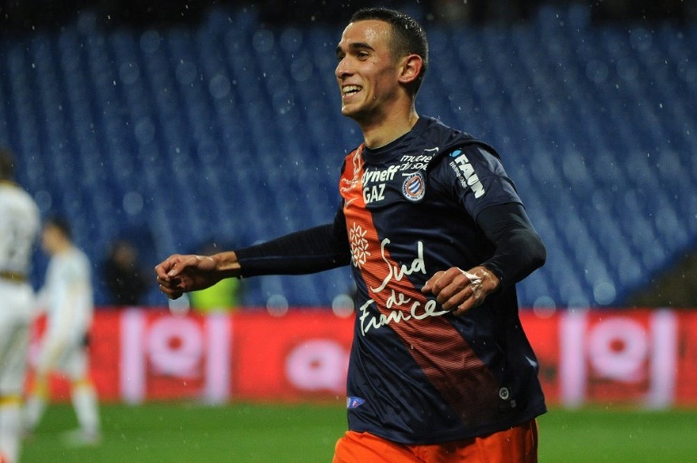 Monpelliers midfielder Ellyes Skhiri celebrates after scoring a goal during the French L1 football match between Montpellier and Lille at the Mosson stadium in Montpellier, southern France, on February 27, 2016