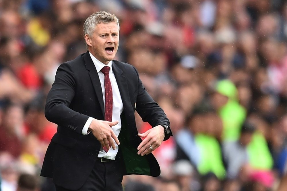 Solskjaer's ties with Old Trafford hanging on three threads. AFP