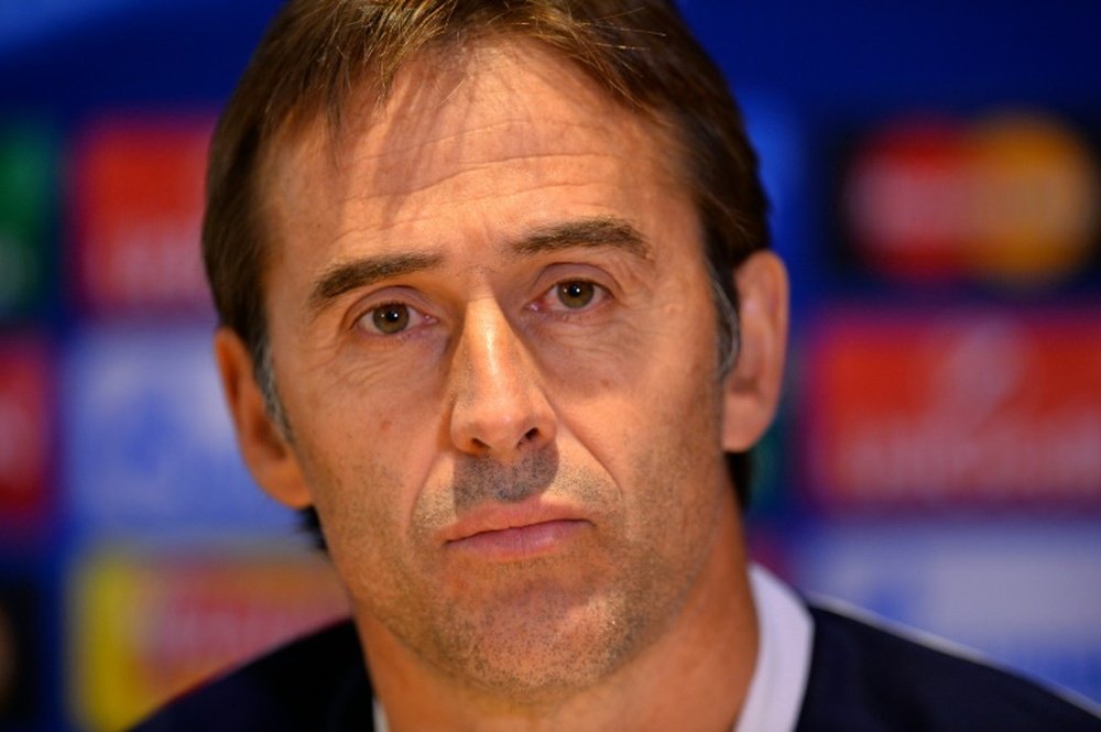 Portos Spanish coach Julen Lopetegui listens during a press conference at Stamford Bridge stadium in London on December 8, 2015 on the eve of their UEFA Champions League group G football match against Chelsea. AFP PHOTO / GLYN KIRK