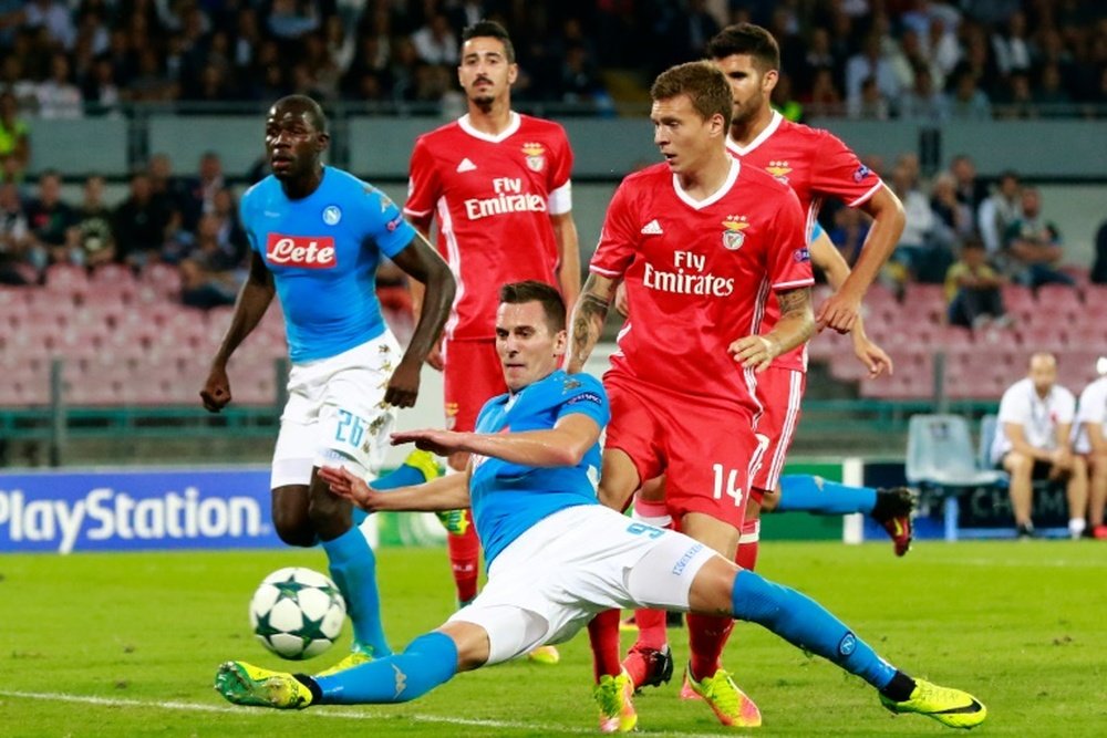 Arkadiusz Milik vies with Benfica defender Victor Nilsson-Lindelof. AFP