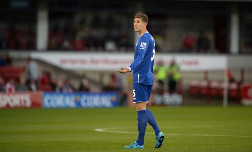 Evertons English defender John Stones gestures during the English League Cup football match between Barnsley and Everton at the Oakwell Stadium in Barnsley, England, on August 26, 2015
