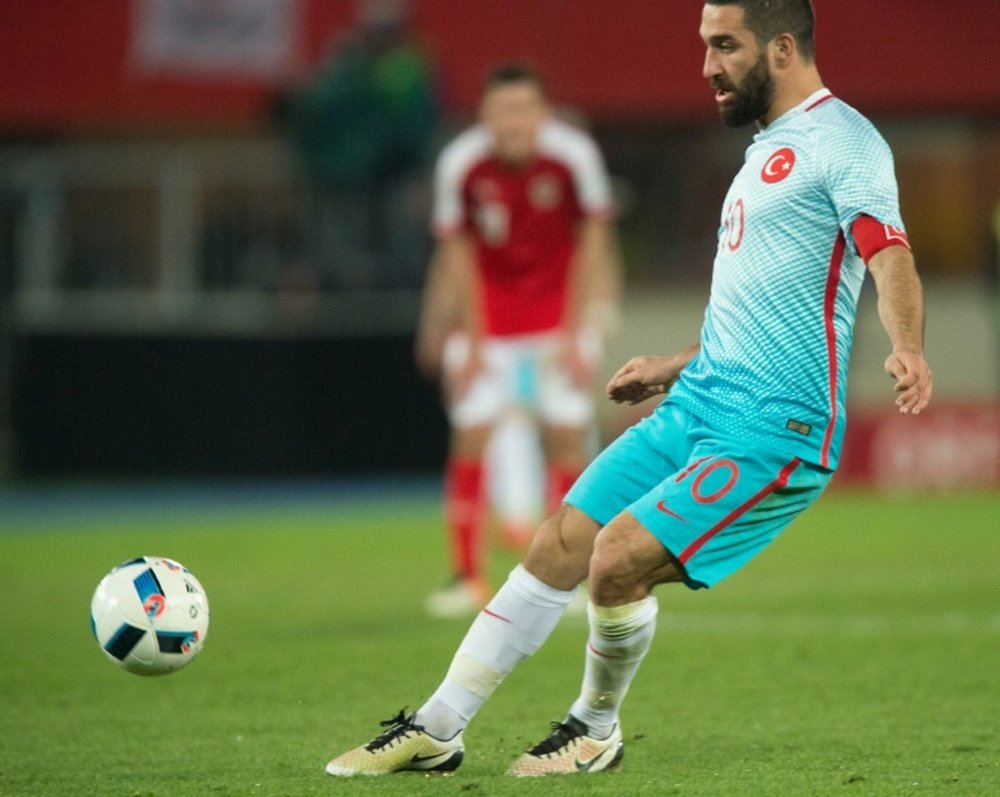 Arda Turan is ready to play for Turkey again. AFP