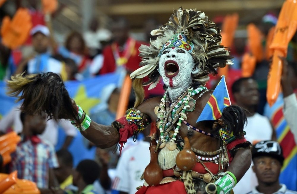 A Congolese supporter cheers for his team on February 4, 2015