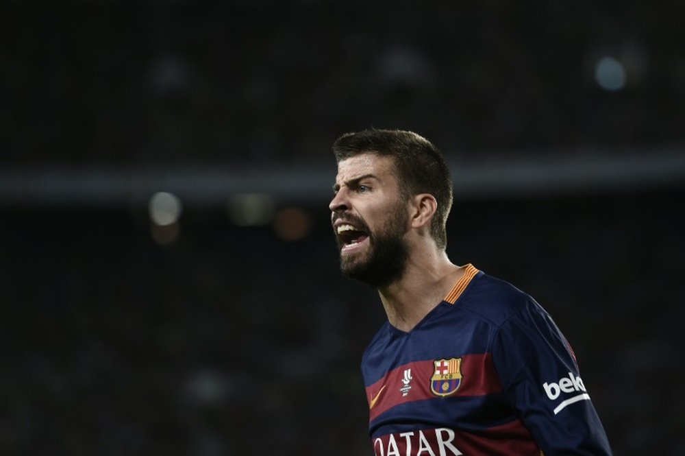 Barcelonas defender Gerard Pique shouts during the Spanish Supercup second-leg football match FC Barcelona vs Athletic club Bilbao at the Camp Nou stadium in Barcelona on August 17, 2015