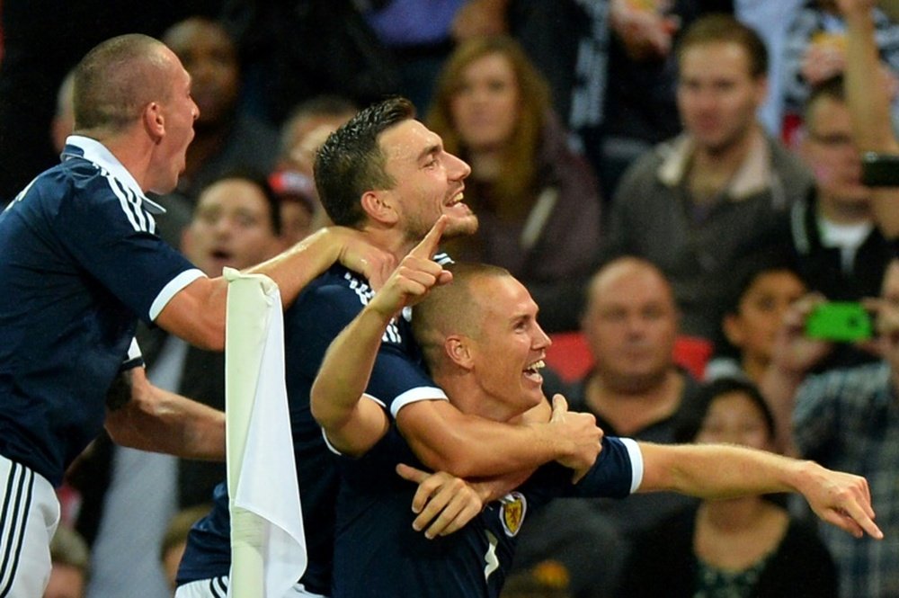 Miller has given his full support to Alex McLeish and the current Scotland squad. AFP