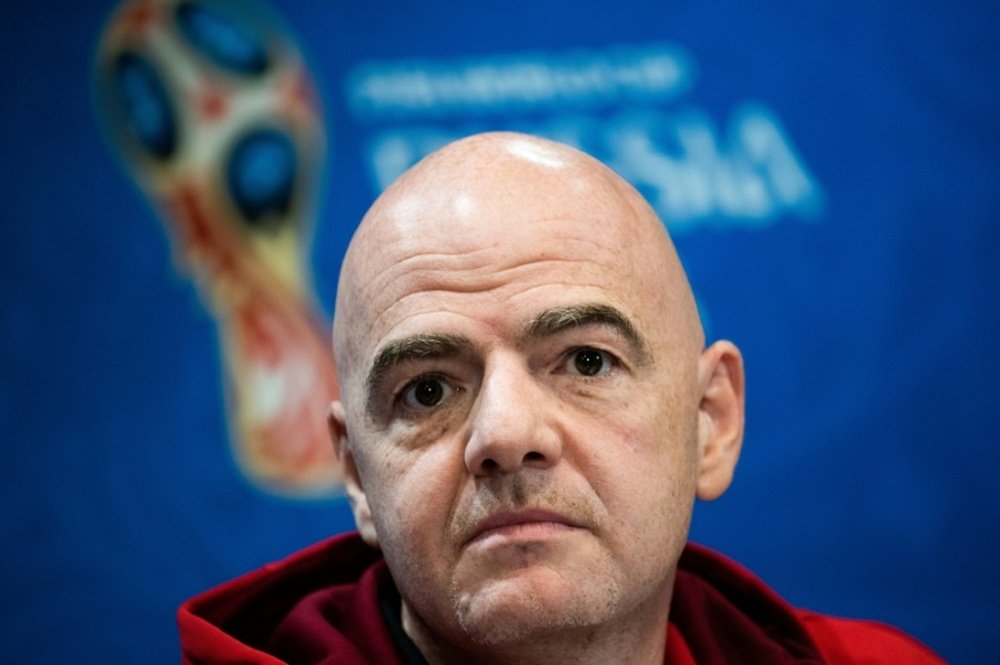 Infantino is determined to push through World Cup reshuffle. AFP