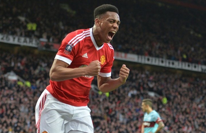 Martial late show keeps Man Utd in FA Cup