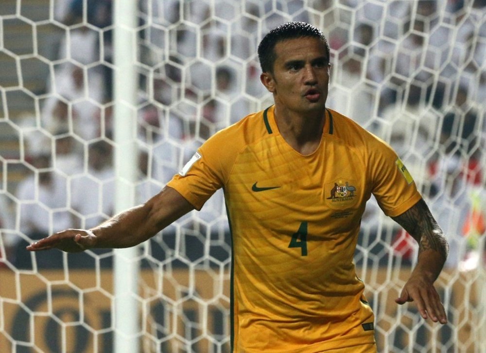 Australias veteran talisma Tim Cahill celebrates after scoring a goal. AFP