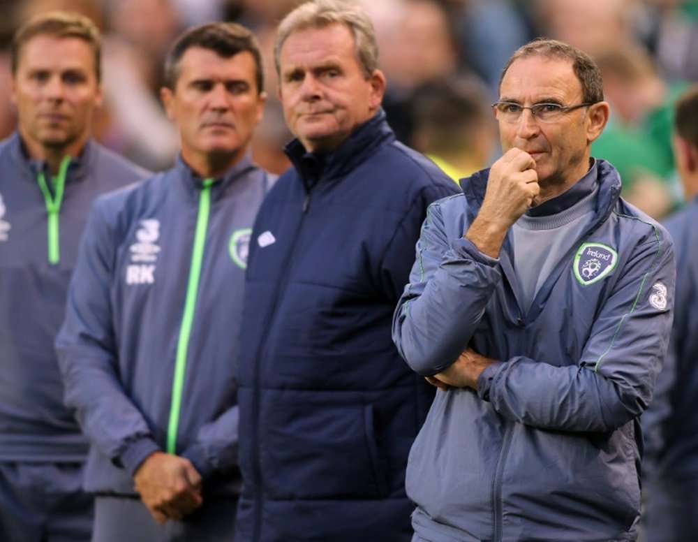 Republic of Irelands manager Martin ONeill (R) looks on ahead of the Euro 2016 qualifying group D football match between Republic of Ireland and Georgia at Aviva Stadium in Dublin on September 7, 2015