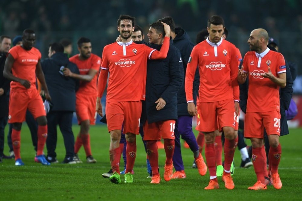 Fiorentina's players celebrate after a match. AFP