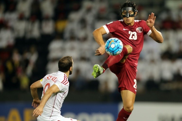 Qatar edge Syria to keep World Cup dream alive