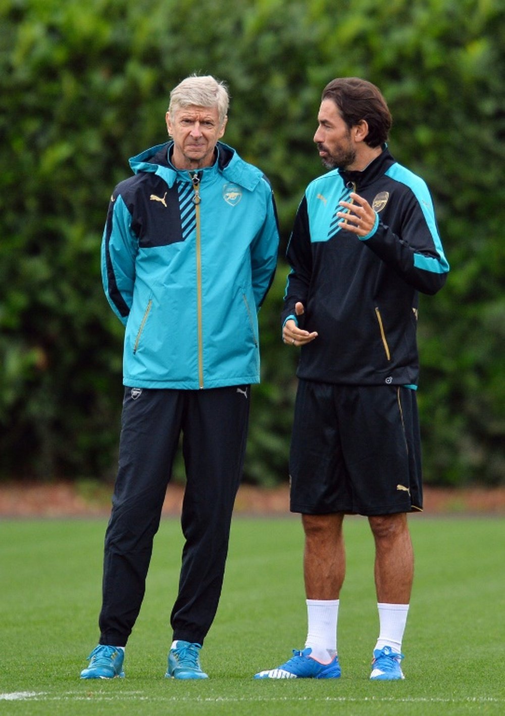 Pires and Wenger pictured in 2015. AFP