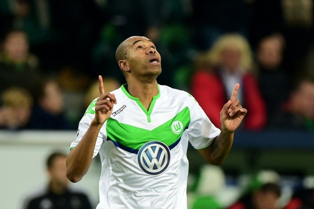Naldo celebrates scoring for Wolfsburg against Manchester United in Wolfsburg on December 8, 2015