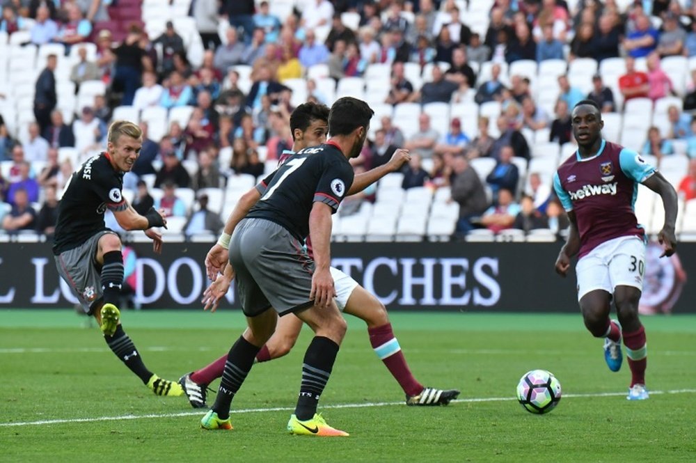 James Ward-Prowse scores Southampton's third goal in a 3-0 win over West Ham. AFP