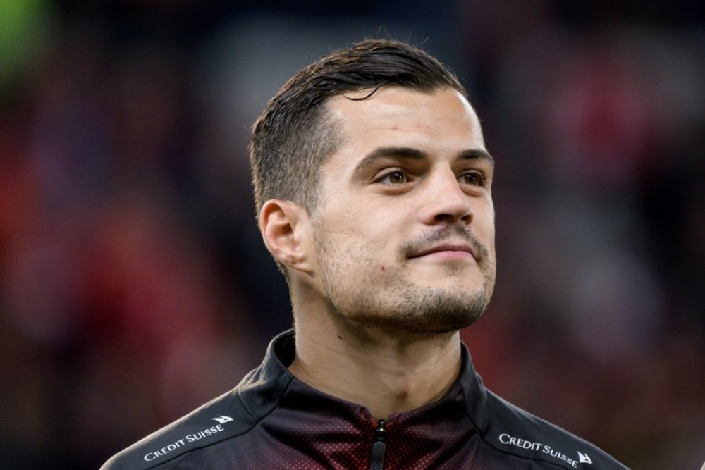 Xhaka pediu perdão pelo seu gesto, mas condenou as ameaças. AFP