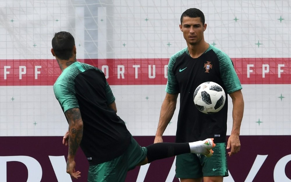In-form Ronaldo looms for Morocco, Spain face Iran. AFP