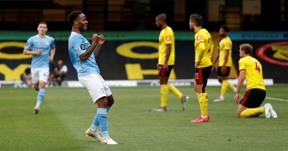 Sterling (2L) got two goals at Watford. AFP