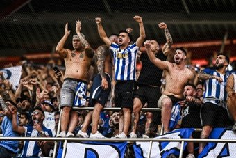 Porto fans urging their team on against Benfica at the Estadio da Luz. AFP