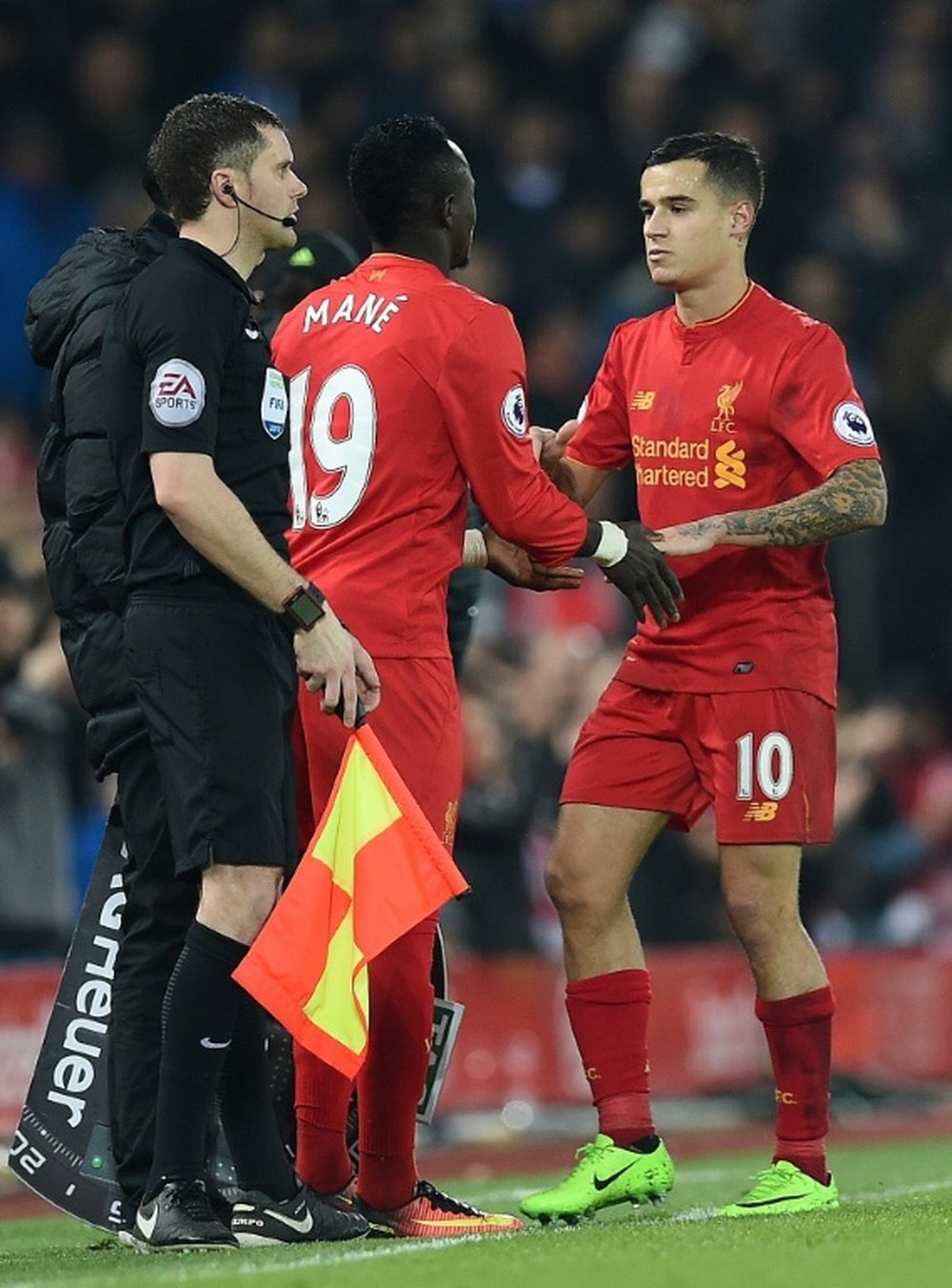 Liverpool's midfielder Philippe Coutinho (R) is substituted. AFP