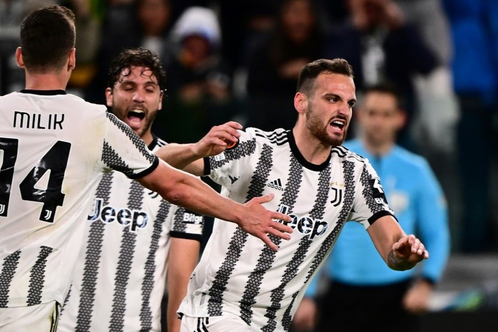 Gatti (R) scored a last-gasp equaliser for Juventus. AFP