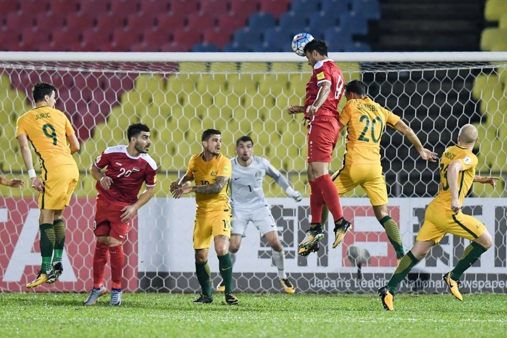 Australian players and media slammed the referee after Syria's controversial late penalty. AFP
