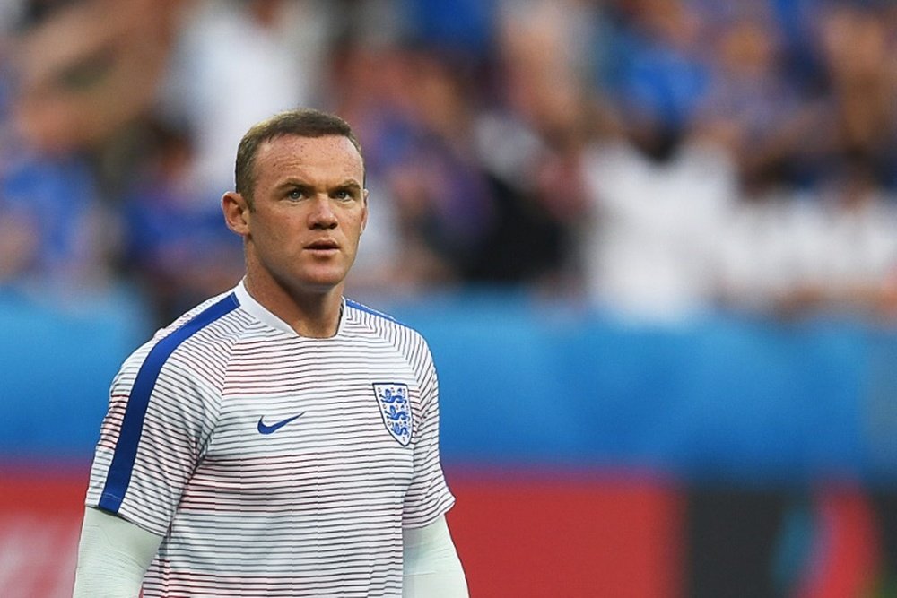 Shearer believes that Rooney should call time on his England career. AFP