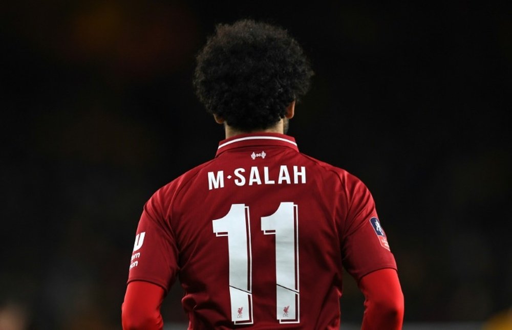 Salah: mesmo números de partidas, 15 gols a menos. AFP
