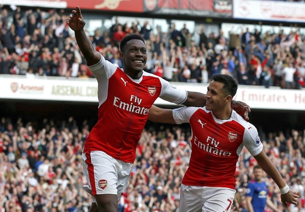 Welbeck and Sanchez have had contrasting starts to this Premier League campaign. AFP