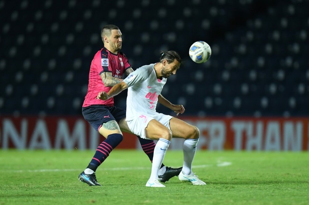 Dejan Damjanovic (R) will not play another AFC CL match. AFP