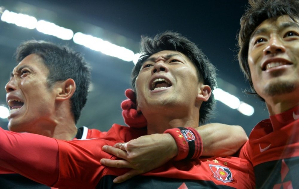 Urawa Reds forward Yuki Muto (centre) celebrates a goal. BeSoccer