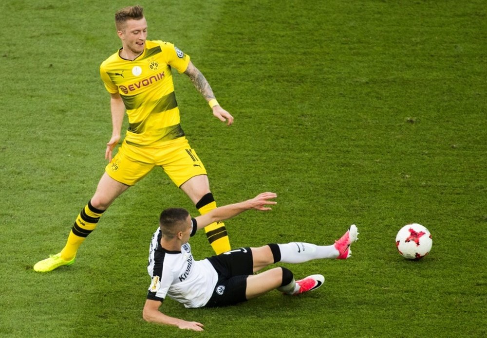 Borussia Dortmund e Augsburg empataram em 1-1. AFP