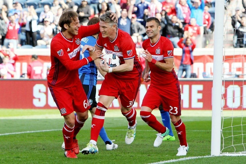 Bastian Schweinsteiger (C) of Chicago Fire celebrates after scoring a goal