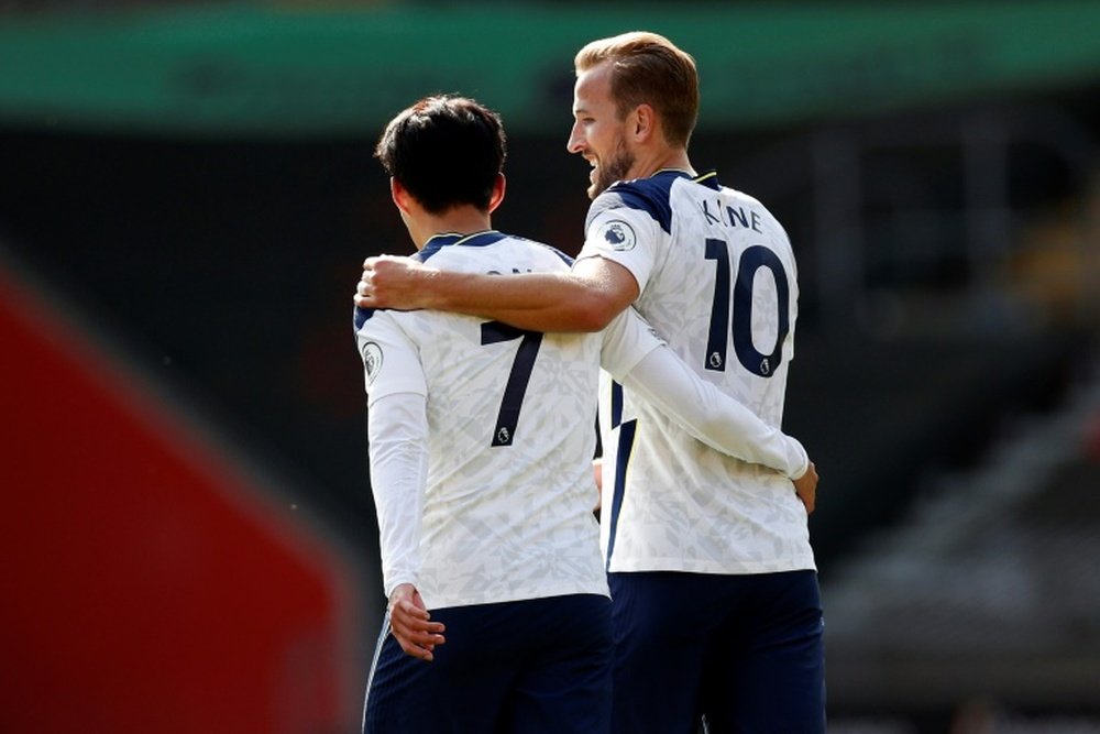 Son believes his teammate Kane will be at Spurs next season. AFP